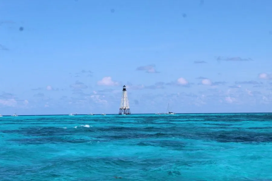 a light house in the middle of the ocean
