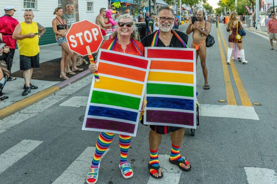 a couple of people that are standing in the street