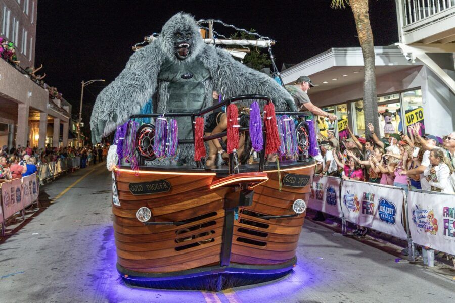 a float in a parade with a gorilla on it