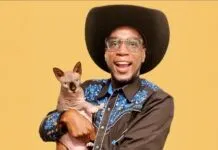WHAT’S COOKING KEY WEST? WHY THE ROYALS RULE IN THE SOUTHERNMOST CITY a man in a cowboy hat holding a cat