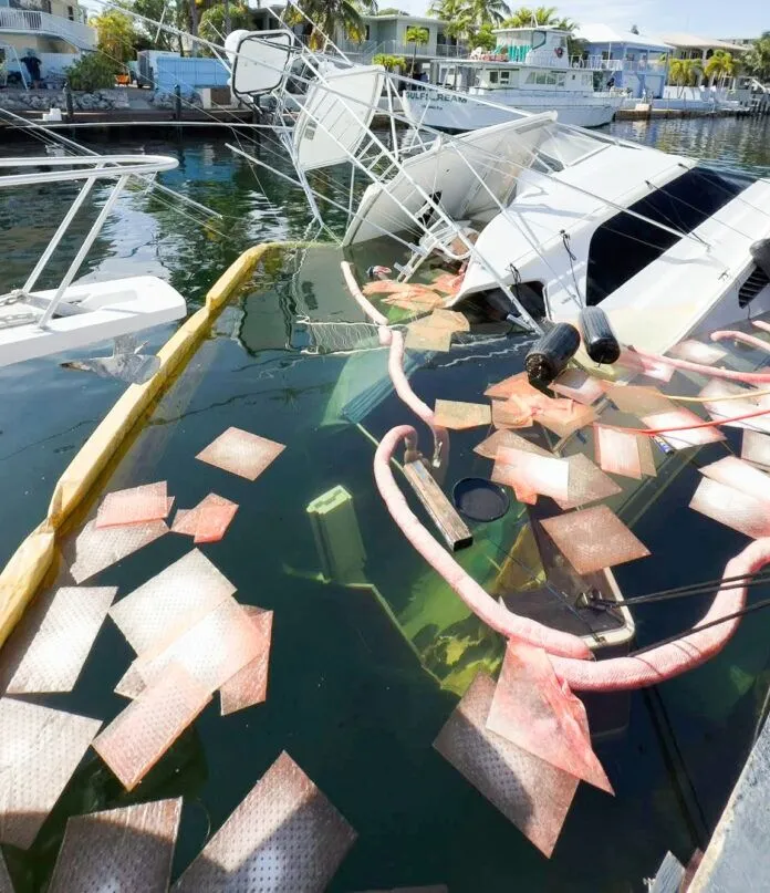 Sunken yacht a boat that is sitting in the water