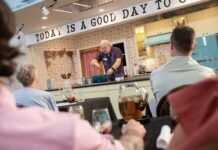 WHAT’S COOKING, KEY WEST? EXPLORE THE FLAVORS AND CULTURE IN 2026 a group of people sitting at a table with wine glasses
