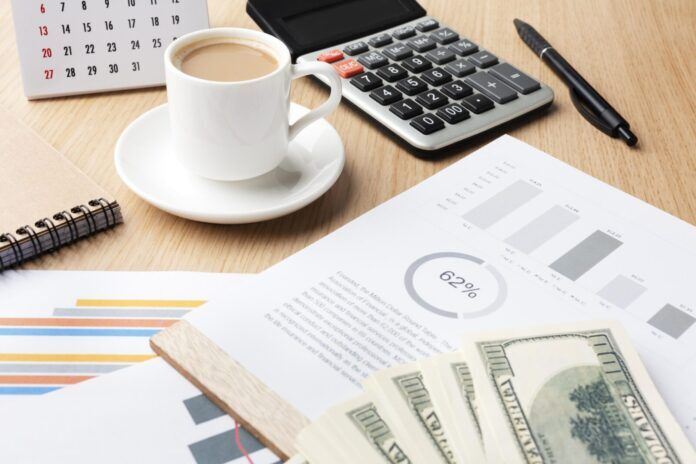 high-angle-desk-with-cash-coffee