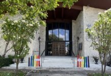 UPPER KEYS CHURCH’S NEW RAINBOW FENCE SIGNIFIES ACCEPTANCE