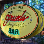 A close up of a sign - Grunts Bar