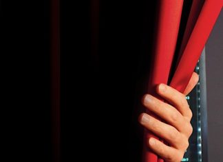 A person in a red shirt - Curtain