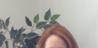 #News: McPherson coming back to MHS as principal - A person holding a cat - Eye