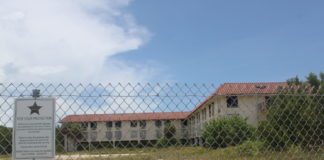 #Property: Buyer interested in Marathon Manor property - A herd of sheep standing on top of a metal fence - Island Breeze Realty, LLC