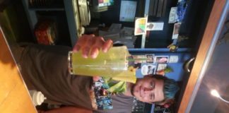 #DrinkUp: The Cafe - A person holding a box - Electronics