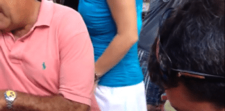 #News: County Administrator loses bet and leg hair - A group of people sitting at a table - Thigh