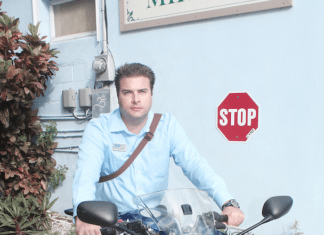 #RealEstate: The real deal on buying in Key West - A person standing in front of a motorcycle - Product