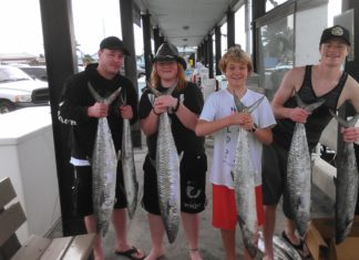 #Fishing: Get great results with kingfish to snappers - Charlie Furbush holding a fish posing for the camera - Car