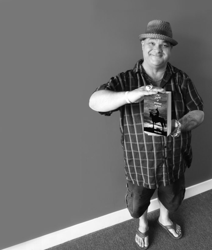 Local radio guy publishes western book – Mark Ryno releases ‘The Sheriff of Whiskey Hollow’ - A person standing posing for the camera - Human behavior