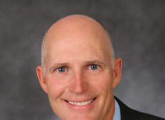 #News: Florida Governor Rick Scott to visit Marathon on Friday - Rick Scott wearing a suit and tie - Rick Scott