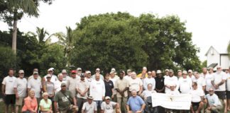 Healing waters - A group of people posing for a picture - Social group