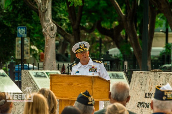 #NeverForget: Mallory Square honors 9/11 tragedy - A group of people in a park - Tree