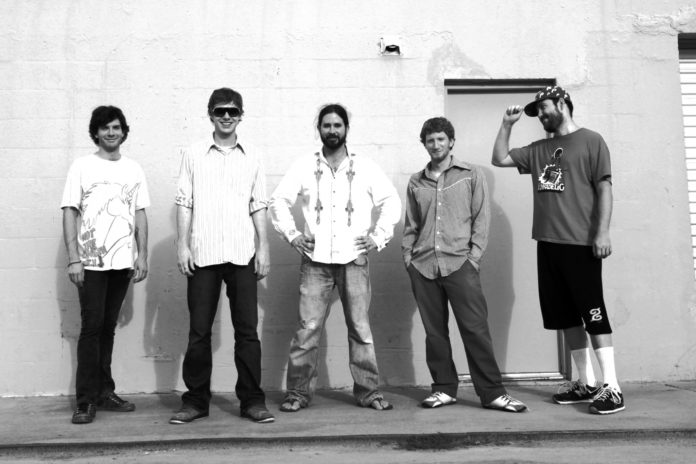 #Music: The Heavy Pets, the perfect jam band, returns to Green Parrot - A group of people posing for the camera - Jamie Newitt