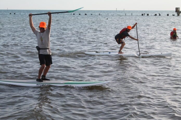 #Events: Special Olympics changes lives - A group of people riding skis on a body of water - Surfing