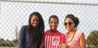 #Events: Revival in the park - A woman sitting next to a fence - Girl