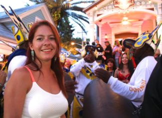 #Events: Key West Junkanoos bring the beat - A person standing in front of a crowd posing for the camera - Key West