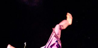 #Events: Goombay Festival spreads its wings - A man sitting on a stage - Rock concert