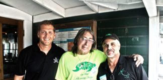 #SeenAroundTown: Locals raise funds for turtles - A man standing in front of a group of people posing for the camera - Ralph Capone