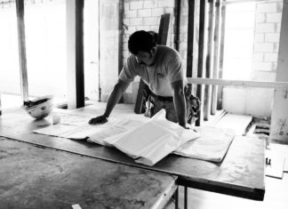 #News: The old Masonic Lodge is transforming to TSKW - A man sitting at a table - The Studios of Key West