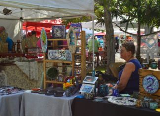 #Events: Art shows & holiday bazaars #Events: Art shows & holiday bazaars - A group of people standing in front of a store - Bazaar