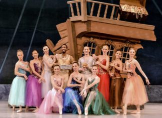 #See: ‘Nutcracker Key West’ transforms classic into subtropical fantasy - A group of people posing for the camera - Mel Fisher