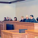 #Seen Around Town: Circuit Judge Timothy J. Koenig is sworn in - A group of people in a room - Judge