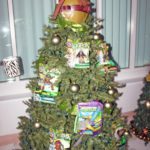 #Events: A slightly tipsy tree for a good cause - A group of stuffed animals in a room - Christmas tree
