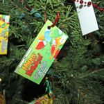 #Events: A slightly tipsy tree for a good cause - A pile of flyers on a tree - Christmas tree
