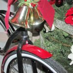 #Events: A slightly tipsy tree for a good cause - A red bicycle sitting next to a stuffed animal - Road bicycle