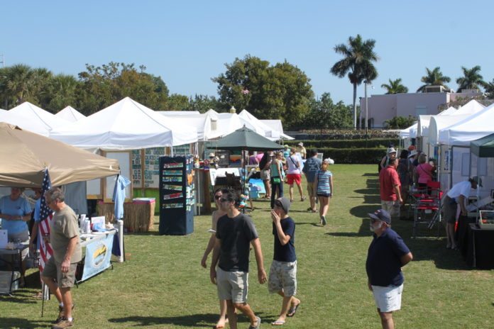Pigeon Key Art Festival is this weekend - A group of people in a tent - Pigeon Key