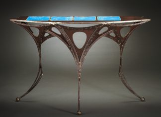 Local artist welds chic, sci-fi inspired furniture - A close up of a computer - Design