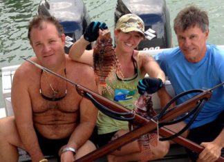 Mirabella travels to New Orleans to showcase lionfish - A couple of people that are sitting on a boat - Boating