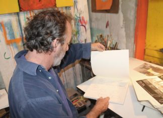 John Martini continues sculpting Key West - A man sitting at a desk - Bahama Village