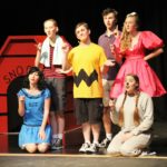 ‘Charlie Brown’ big hit at Marathon High School - A group of people posing for a photo - Musical theatre