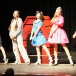 ‘Charlie Brown’ big hit at Marathon High School - A group of people walking on the court - Dance