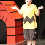 ‘Charlie Brown’ big hit at Marathon High School - A young boy standing in a room - T-shirt