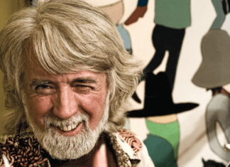 Founding member of Nitty Gritty Dirt Band takes the stage - John McEuen smiling for the camera - Muzio Clementi
