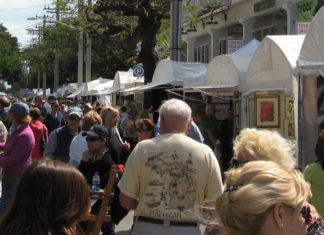 Key West Art Center to host 50th Annual Old Island Days Art Festival Feb 21 – 22 - A group of people standing in front of a crowd - Bazaar