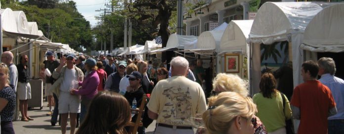 Key West Art Center to host 50th Annual Old Island Days Art Festival Feb 21 – 22 - A group of people standing in front of a crowd - Bazaar