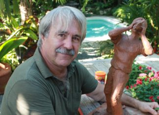 Statue to be unveiled – Friend and artist Tom Joris remembers Albert Kee A person sitting in a garden smiling - KEY WEST HIGH SCHOOL