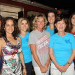 Party for the ‘Miler’ – Bottle Cap Lounge hosts pre-party for runners - A group of people posing for a photo - KEY WEST HIGH SCHOOL