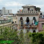 All things Cuba – The Weekly visits the Island ‘A Million Miles Away’ - A group of people standing in front of a building - Tree