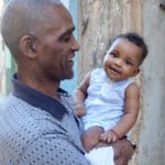 All things Cuba – The Weekly visits the Island ‘A Million Miles Away’ - A man holding a baby - Toddler