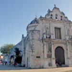 All things Cuba – The Weekly visits the Island ‘A Million Miles Away’ - A group of people walking in front of a church - Basilica