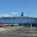 All things Cuba – The Weekly visits the Island ‘A Million Miles Away’ - A group of people sitting in a parking lot - MS Island Escape