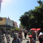 All things Cuba – The Weekly visits the Island ‘A Million Miles Away’ - A group of people walking down a street - Street